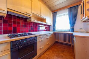 A kitchen or kitchenette at Apartments Sal Feur