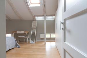 A bed or beds in a room at Tribunali suite de charme