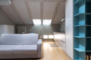 A seating area at Tribunali suite de charme