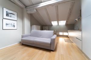A seating area at Tribunali suite de charme
