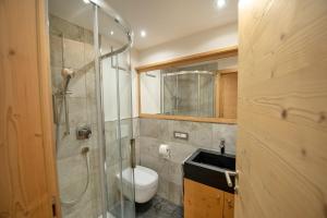 Kúpeľňa v ubytovaní Apartments Alpen Domus + 14 fotografií