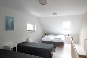 Postel nebo postele na pokoji v ubytování MEDUSA apartamenty i bungalowy