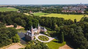 an aerial view of an estate with a clock tower at Guesthouse Scherp in Middelburg