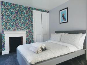 Voodi või voodid majutusasutuse The York Riverside Suites toas