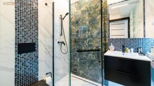 Kúpeľňa v ubytovaní Wonder Home - Apartamenty Blisko Gór - blisko szlaków turystycznych, wyciągów, restauracji, deptaka + 37 fotografií