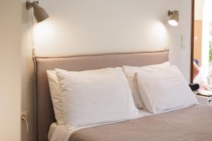 Posteľ alebo postele v izbe v ubytovaní Aloe Apartments