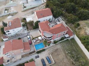an aerial view of a house with a pool at Villa Sv. Petar in Sveti Petar