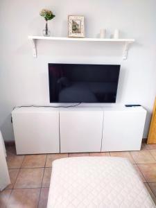 TV a/nebo společenská místnost v ubytování Gredosrentals - Apartamento Castillo