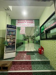 a grocery store with a turkey winter hospital and grocery store at Variety winner hostel in Hat Yai