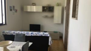 TV a/nebo společenská místnost v ubytování a casa di Manu