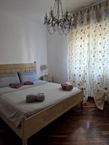 Posteľ alebo postele v izbe v ubytovaní LA QUIETE TRA LE VIGNE Tuscany