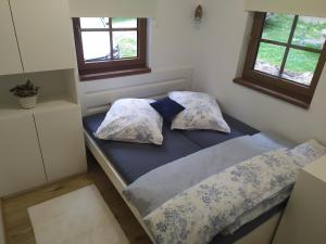 Postel nebo postele na pokoji v ubytování Na paloučku
