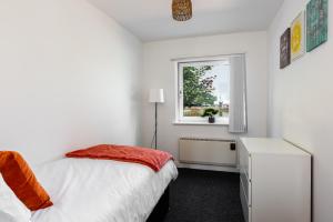 Krevet ili kreveti u jedinici u okviru objekta Princes - 2 Bedrooms Parking Wi-Fi - Cozy Pads