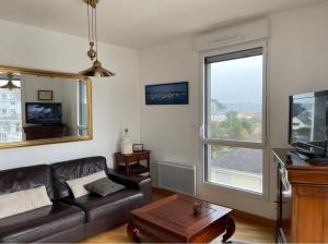 Μια τηλεόραση ή/και κέντρο ψυχαγωγίας στο Appartement Le Rev