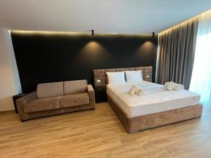 Letto o letti in una camera di Hotel LEON - Beach Front