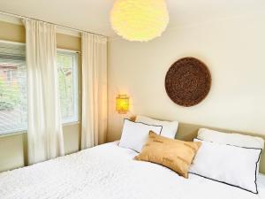 Postel nebo postele na pokoji v ubytování Trendy House Hattem nr64