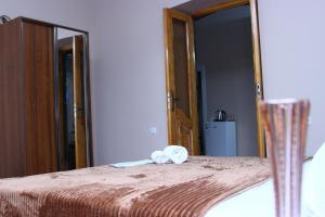 Postel nebo postele na pokoji v ubytování DARBAS GUEST HOUSE