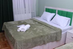 Postel nebo postele na pokoji v ubytování DARBAS GUEST HOUSE