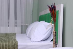 Postel nebo postele na pokoji v ubytování DARBAS GUEST HOUSE