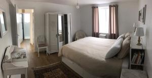 Posteľ alebo postele v izbe v ubytovaní Appartement RDC de maison principale