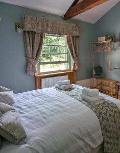 Tempat tidur dalam kamar di Banks Bed & Continental Breakfast