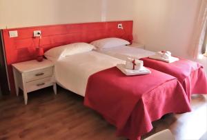 Posteľ alebo postele v izbe v ubytovaní B&B Podere Lambure- società agricola
