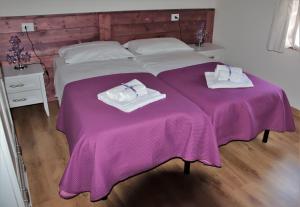 Posteľ alebo postele v izbe v ubytovaní B&B Podere Lambure- società agricola