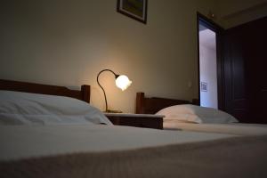 A bed or beds in a room at Villa Helidoni