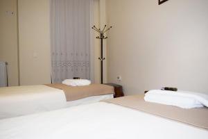 A bed or beds in a room at Villa Helidoni