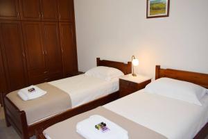 A bed or beds in a room at Villa Helidoni