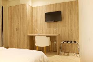 TV a/nebo společenská místnost v ubytování Hotel El Djenina + 37 fotografií