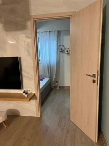 Posteľ alebo postele v izbe v ubytovaní Cozy Spot Piraiki