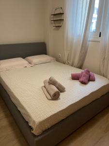 Posteľ alebo postele v izbe v ubytovaní Cozy Spot Piraiki