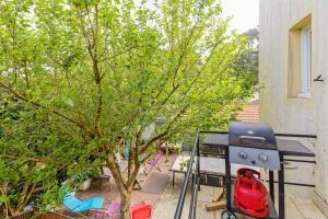 Vonkajšia záhrada v ubytovaní Le Doolie's Biarritz - Visayas Garden WIFI TV BBQ