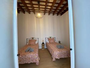 Posteľ alebo postele v izbe v ubytovaní Azvalia - Puro Puerto Casco Histórico