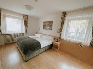 Voodi või voodid majutusasutuse Hotel Pradat toas