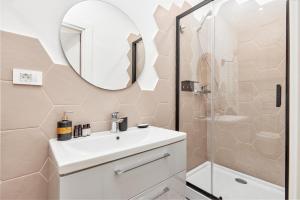 a bathroom with a sink and a shower at Kotor Nest in Kotor