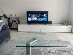 Μια τηλεόραση ή/και κέντρο ψυχαγωγίας στο Ferienhaus Weitblick Sankt Wendel