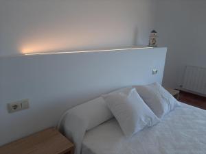 Postel nebo postele na pokoji v ubytování Apartamentos Costas de Bueu B