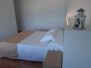 Postel nebo postele na pokoji v ubytování Apartamentos Costas de Bueu B