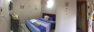 Gulta vai gultas numurā naktsmītnē Hospedaje Encarnación