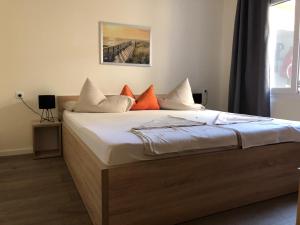 Postel nebo postele na pokoji v ubytování Appartements Antunovic
