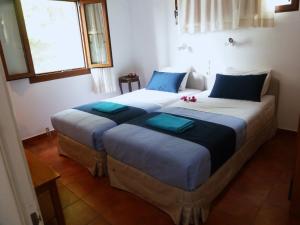Кровать или кровати в номере Milia Bay Hotel Apartments