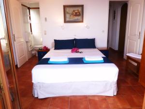 Кровать или кровати в номере Milia Bay Hotel Apartments