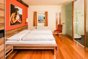 Postel nebo postele na pokoji v ubytování Hotel Traube
