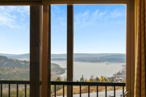 a view of a lake from a window at Beautiful Branson Lodge Close to All the Action in Branson