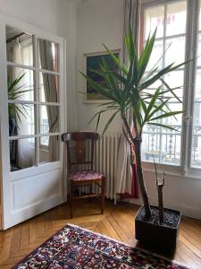 Зона вітальні в Bel Appartement Haussmannien - Gare de Lyon