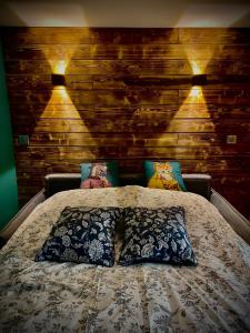Łóżko lub łóżka w pokoju w obiekcie Le Garden & SPA