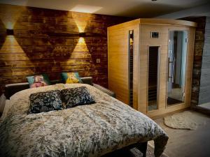 Łóżko lub łóżka w pokoju w obiekcie Le Garden & SPA