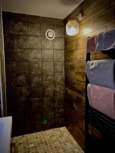Łóżko lub łóżka w pokoju w obiekcie Le Garden & SPA